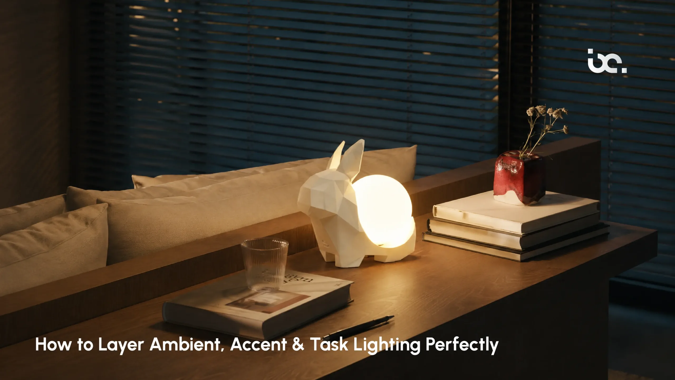 Layered lighting design with ambient accent and task lighting in a modern living space